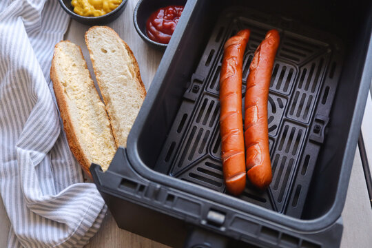 Hotdog sausages on grill. Airfryer sausages 