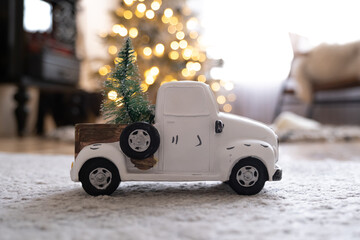 Christmas toy car with a small tree