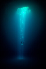 cave diver instructor leading a group of divers in a mexican cenote underwater