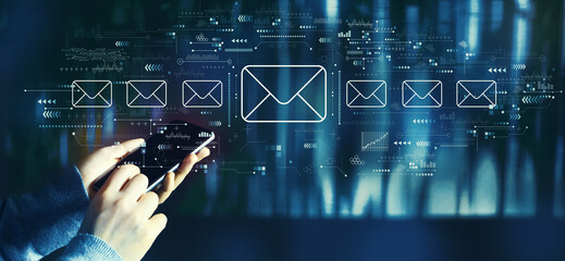 Email concept with person using a smartphone