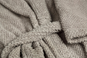 close up grey bathrobe, focus on belt