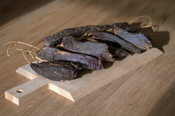 delicious ham of a old chamois female on the wood board is ready for freeze