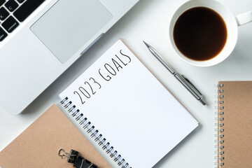 Notebook with 2023 goals text on it to apply new year resolutions and plan.