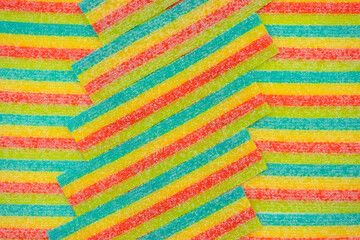 Assorted colorful gummy candies. Top view. Jelly donuts. Jelly bears. Isolated on a white background.