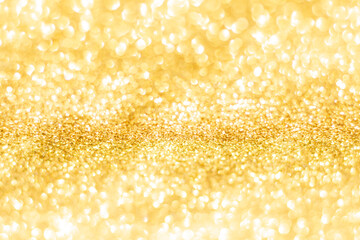 Gold glitter defocused texture background. gold christmas abstract background.