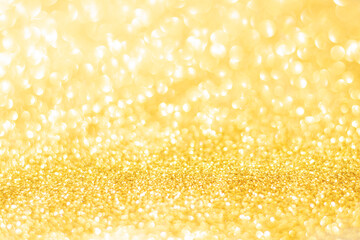 Gold glitter defocused texture background. gold christmas abstract background.