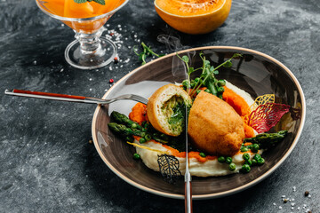 Chicken Kiev, breaded chicken breast stuffed with herbs and butter. cutlet breast with mashed...