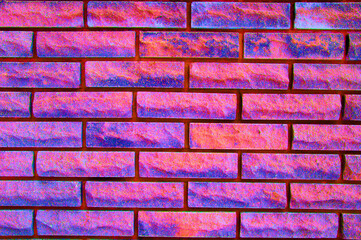 background colored purple, pink, blue texture brick. High quality photo