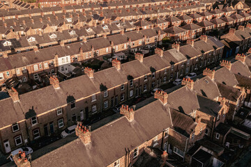 Aerial view of rows of back to back terraced house in a UK city in the North