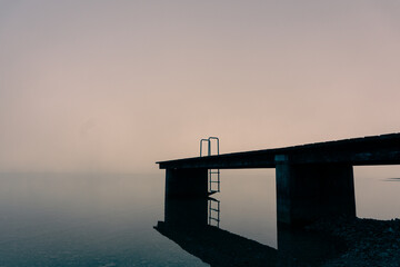 foggy lake in the morning - foggy pier