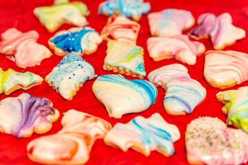 Baked cutout Christmas cookies iced with a twist colorful