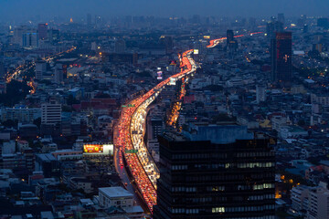 Aerial view of busy cars with traffic jam in the rush hour on highway road street on bridge in...