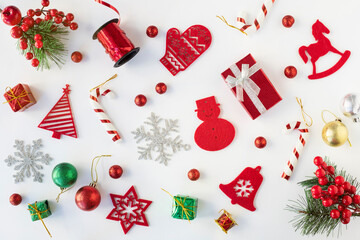 Christmas composition made of christmas decoration on white background. Lay flat, top view.