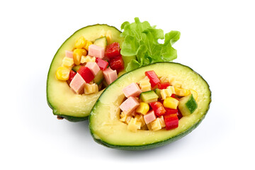 Bio organic avocado filled with cheese, corn, meat and herbs.