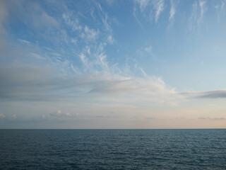 Sea sky and horizon, beautiful calm landscape. the sea before sunset, transparent clouds in the sky