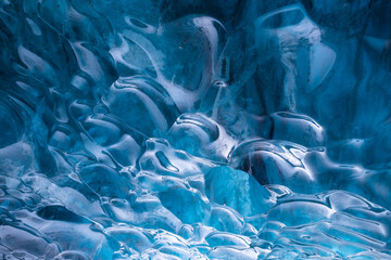 The Ice Cave in Iceland. Crystal Ice Cave. Vatnajokull National Park. Inside view of the ice as a...