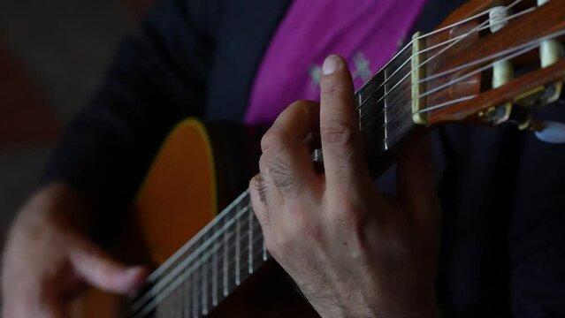 tomorrow's detail of what he plays on the guitar. 4k video.