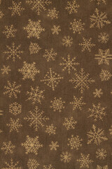Brown and gold snowflake winter background