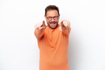 Fototapeta premium Middle age caucasian man isolated on white background surprised and pointing front