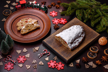 Tasty christmas stollen with marzipans, dried fruits and nuts
