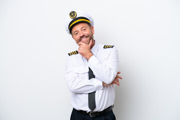 Airplane middle age pilot isolated on white background smiling