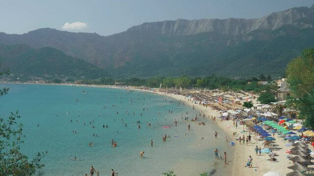 The crowded famous Golden Beach in Thassos Island Greece during summer, top view panorama
