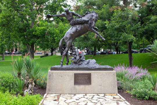 AUSTIN TEXAS - 22 MAY 2017: Cowboy Statue on the grounds of the State Capitol Building