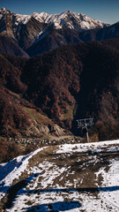 Snowy mountains against a blue sky