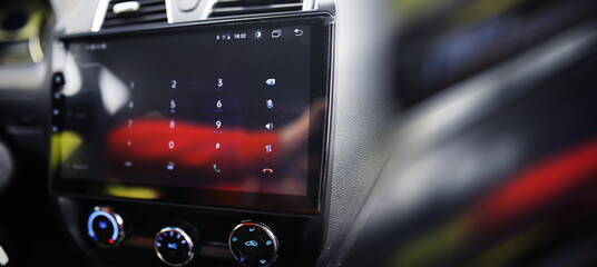 The process of choosing climate control in the car. Various controls in auto switches. Modern car...