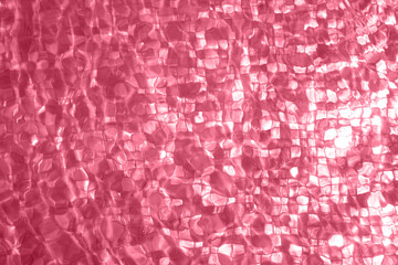Sparkling background made of Vivid Magenta 2023 color. Color of the 2023 year Viva Magenta blurred glitter backdrop for holidays and parties. Demonstrating color of the 2023 year Viva Magenta.
