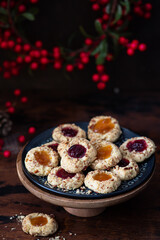 Christmas cookies with nuts and jam.  Holiday baking concept.