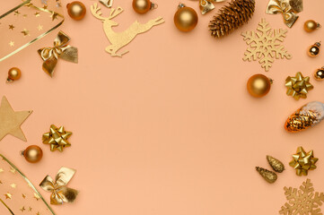Christmas, winter composition. Flat lay of golden christmas decorations on beige background. Christmas,new year concept.
