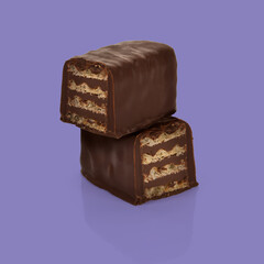 Falling waffle chocolate bars isolated on Purple background