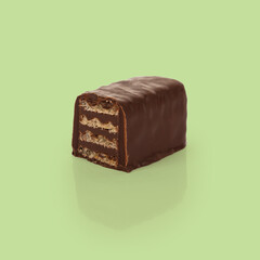 Falling waffle chocolate bars isolated on Green background