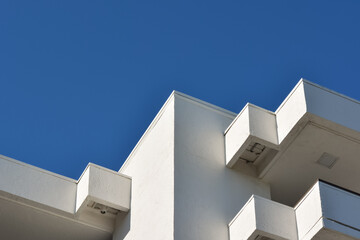 a white building with a blue sky