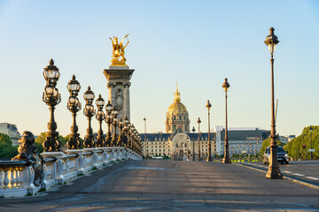 Dome of Les Invalides seen across Pont Alexandre III bridge in Paris. France