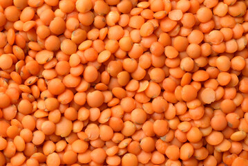 Raw uncooked lentils background, lentils texture