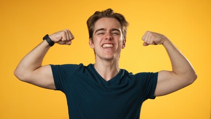 Portrait of young hipster man 20s with show muscles, have fun energy isolated on yellow background in studio