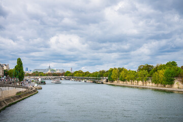 Fototapeta na wymiar Bridge Passerelle Léopold Sédar Senghor by Seine river in Paris. France