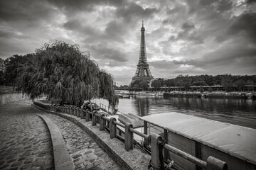 Eiffel Tower with cloudy sky in Paris. France