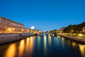 Pont d'Arcole at night by Seine river in Paris. France
