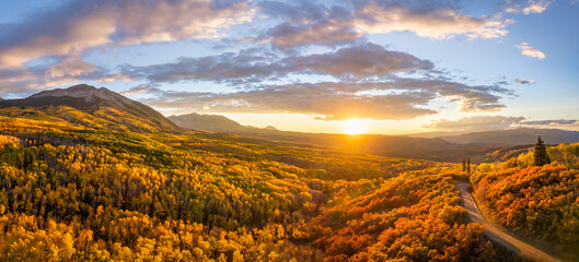 Naklejka na ściany i meble Golden Sunset Autumn colors at Kebler Pass in the Colorado Rocky Mountains - near Crested Butte on scenic Gunnison County Road 12 - Beckwith 