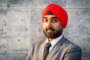 Punjab businessman wearing traditional hindi head scarf and corporate elegant suit