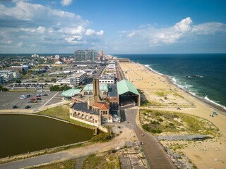 Drone of a building in Asbury Park Beach Boardwalk New Jersey by the Atlantic Ocean