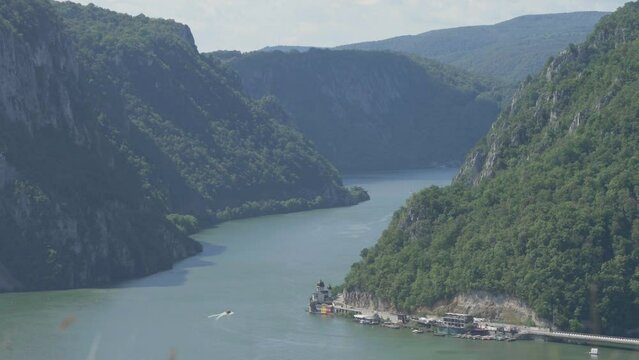 Danube gorge through Carpathian Mountains with Mraconia Monastery on river bank