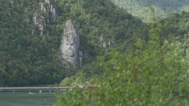 The rock sculpture of Decebalus Rex (king of Dacia) on Danube river bank in Romania