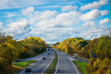 A5 dual carriageway during autumn season in Milton Keynes. England - obrazy, fototapety, plakaty