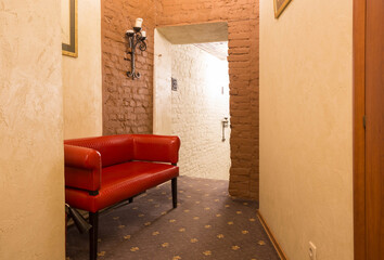 loft-style interior with red sofa