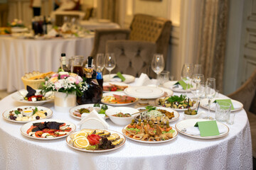 Server table with different food in the restaurant