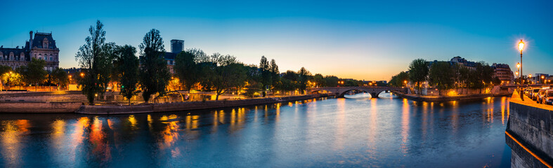 Seine river Panorama of Paris overlooking Pont Louis-Philippe at dawn